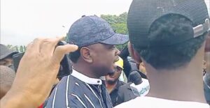 Ayodele Olawande addressing protesters at Eagles Square